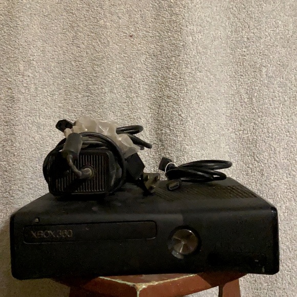 Xbox 360 with power cord and HDMI cable